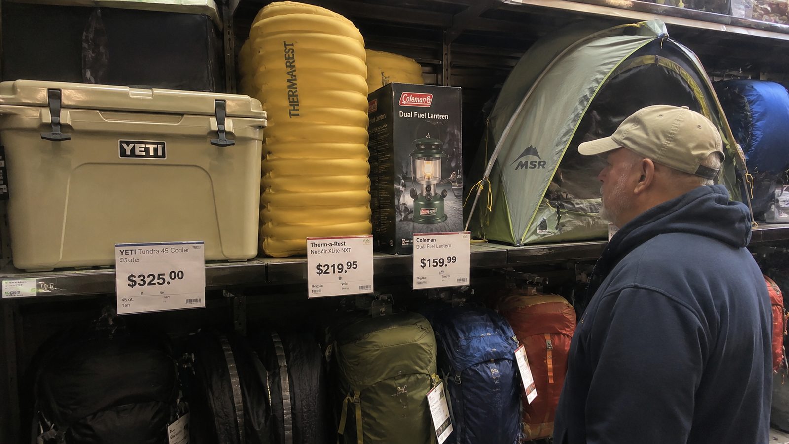 A shelf of expensive modern gear beside the plain old-way alternative