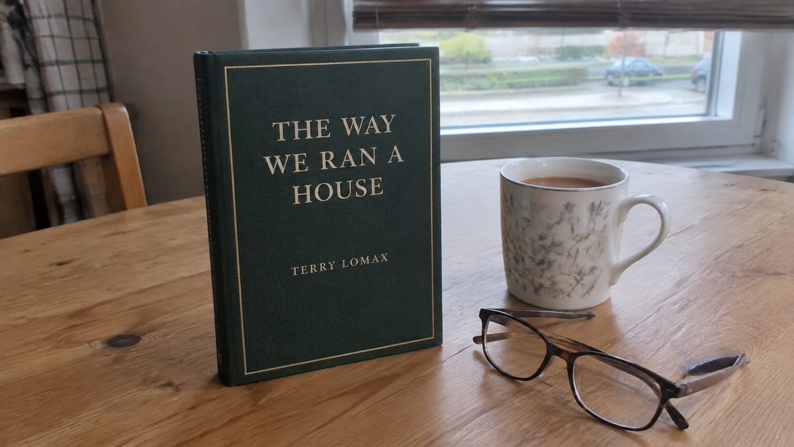 The Way We Ran a House, a dark green cloth book with cream lettering and a gold rule